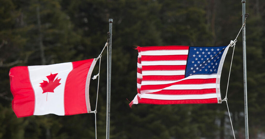 canada-american-flag-border-1.jpg